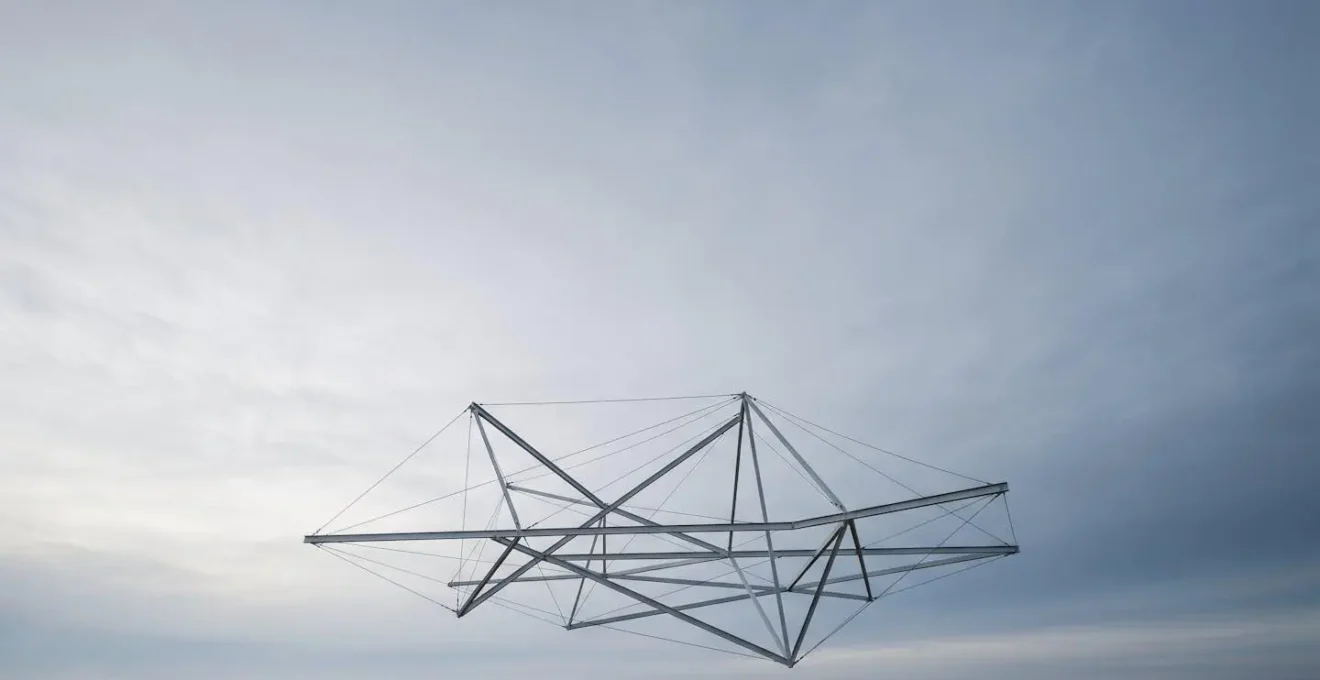 Environmental wide shot showing minimal architectural framework against vast negative space representing guide tone structure