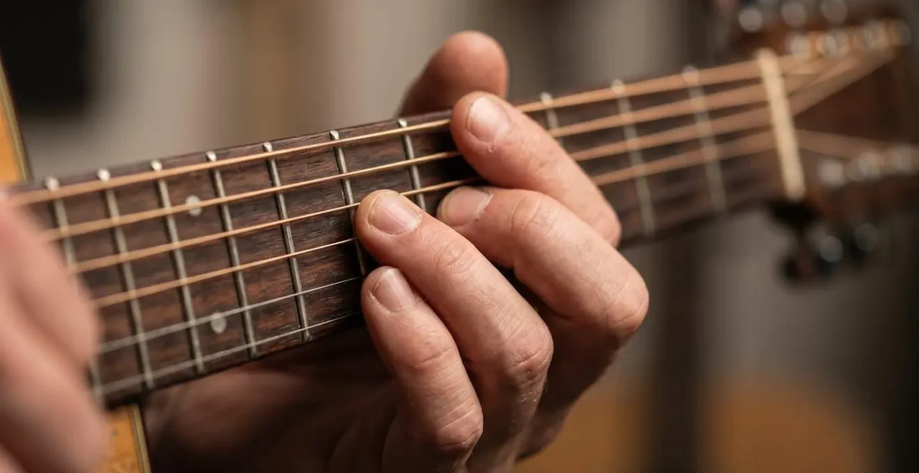 Close-up of musician creatively rearranging song structure and composition